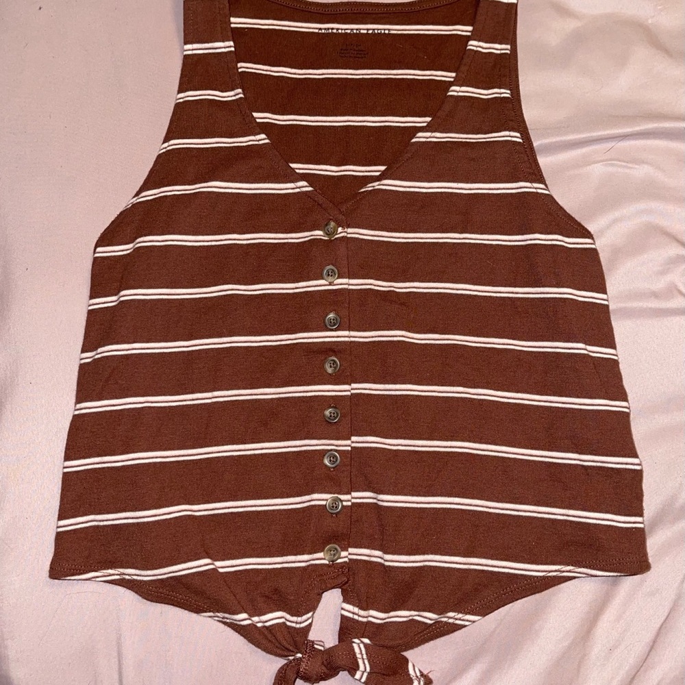 Tank top with knot on bottom
